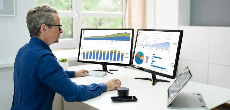 Data Analyst With Business Graph Stock Photos
