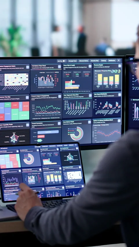 Data Analyst Carefully Studies Dashboard Metrics On Laptop Stock Footage 340398955