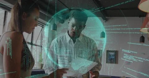 Data analyst in checkered shirt reading documents in office, with holographic Stock Photos