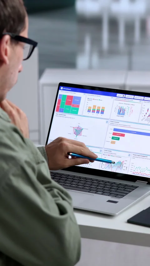 Data Analyst Closely Monitors Financial Dashboard Metrics Stock Footage 347910104