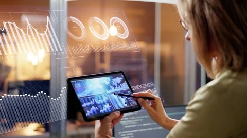 Data Analyst Examining Analytics on Computer Dashboard Video stock 257134913