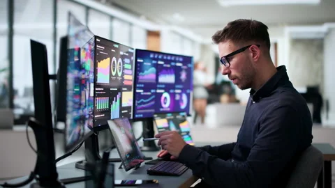 Data Analyst Reviewing Financial Dashboard Stock Footage 340397578