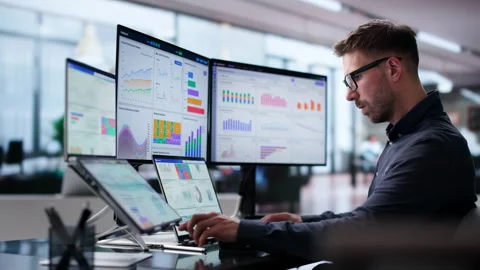 Data Analyst Reviewing Financial KPIs Stock Footage 342961405