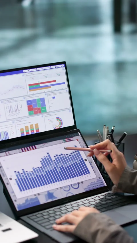 Data Analyst Reviewing Financial KPIs Stock Footage 343889906