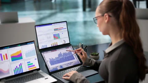 Data Analyst Reviewing Financial KPIs Stock Footage 345327343