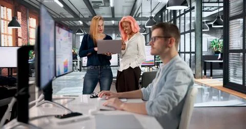 Data Analyst Reviews KPI Dashboard With Team During Important Business Meetin Stock Photos