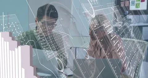 Data analyst tapping laptop and reviewing reports while holographic charts Stockbeeldmateriaal 312638737