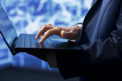 Data analyst using laptop to implement artificial intelligence, close up Stock Photos