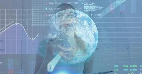 Data analyst wearing teal top tapping stylus on holographic charts in office, Stock Photos
