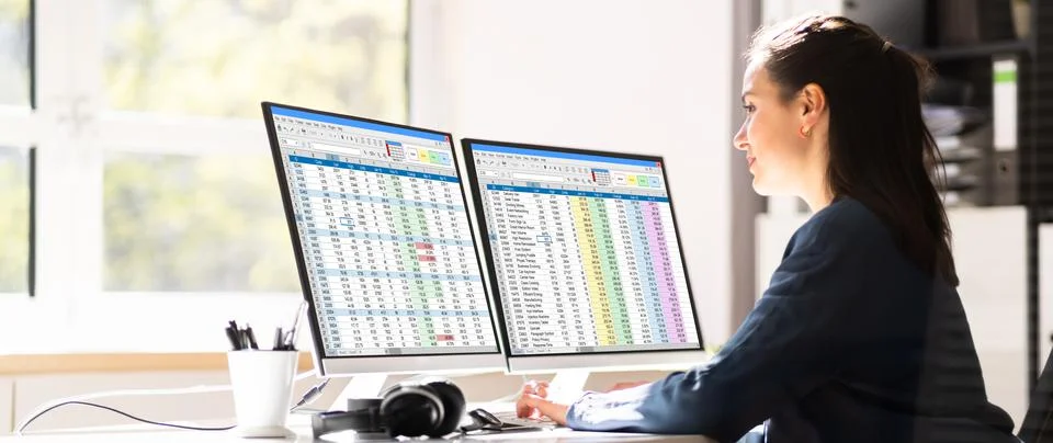 Data Analyst Woman Using Spreadsheet Stock Photos