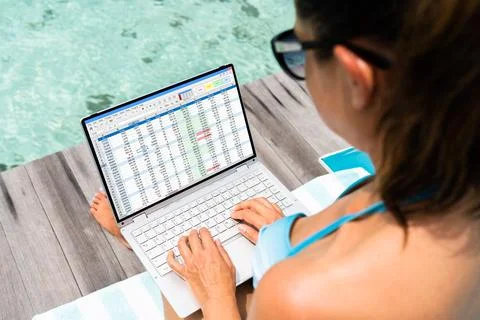 Data Analyst Woman Using Spreadsheet On Computer Foto stock