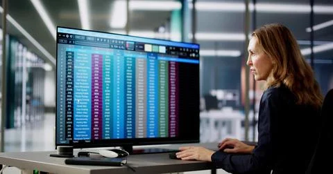 Data Analyst Woman Using Spreadsheet Stock Photos
