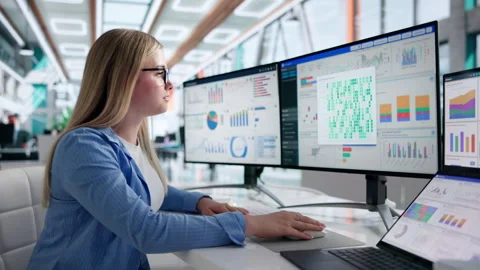 Data Analyst Working Carefully On Financial Dashboard Stock Footage 343885931