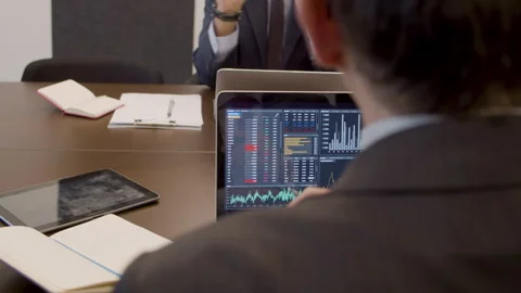 Data analysts sitting in meeting room and working together Stock Footage 231577161