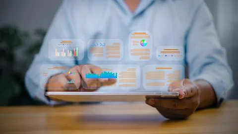 Data analytics concept with businessman using tablet to analyze digital rep.. Stockfoto's