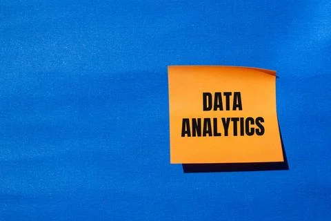 Data analytics message written on orange paper with blue background. Conceptu Stock Photos