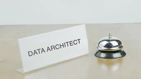Data Architect Office or Room with Hand Ringing The Bell on Desk or Table Stock Footage 300657016
