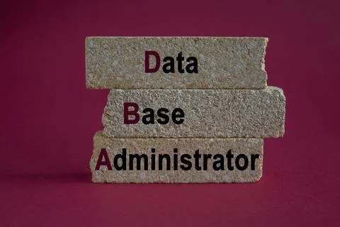 Data Base Administrator symbol. DBA acronym on brick blocks with letters. Stock-Fotos