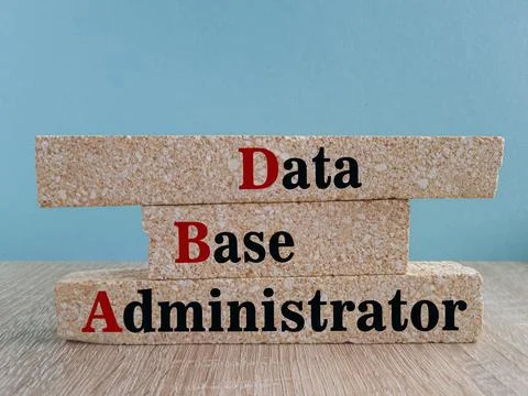 Data Base Administrator symbol. DBA acronym on brick blocks with letters. Stock Photos