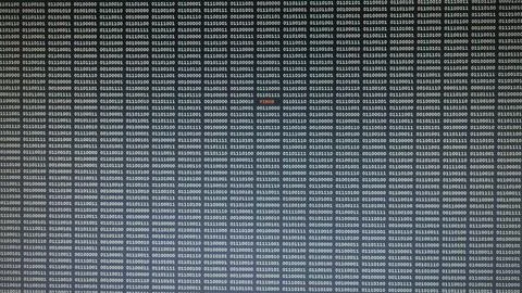 Data bites (zero one digits) flowing on screen, virus detection Stock Photos