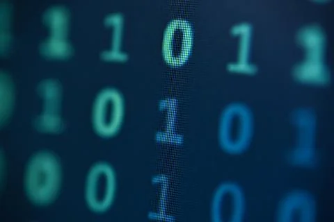 Data bits computer bits blue background of screen monitor. Stock Photos