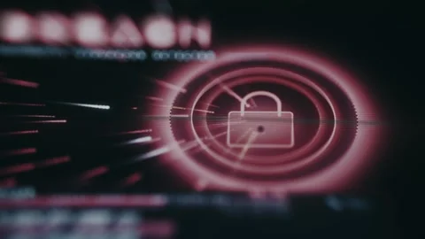 Data breach alert represented by a red circuit board with a padlock in the Stock Footage 335880167