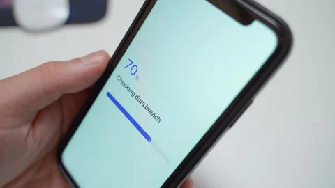 Data breach check progress bar stops at 70 percent on smartphone screen Stock Footage 342602978