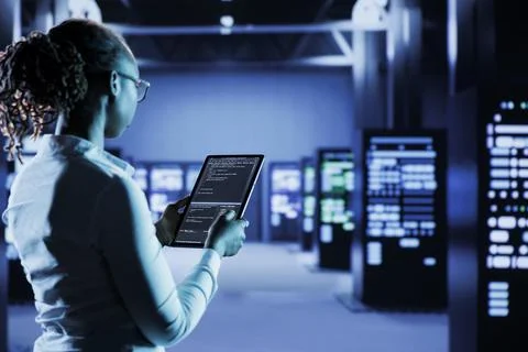 Data center admin codes on tablet Stockfoto's