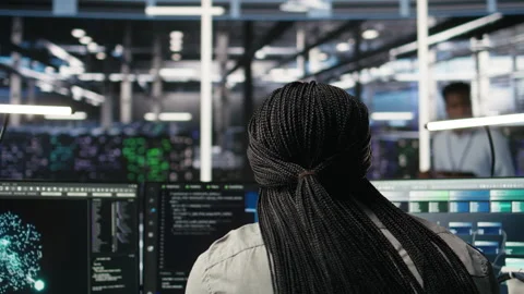 Data center admin does machine learning node tree programming Stock Footage 307036644