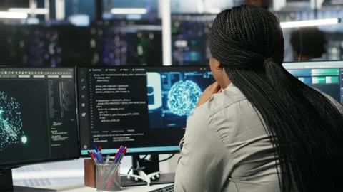 Data center admin does machine learning node tree programming Stock Footage 308044309