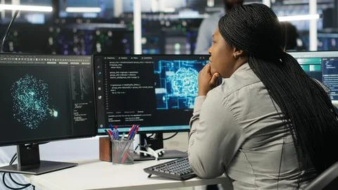 Data center admin does machine learning node tree programming Stock Photos
