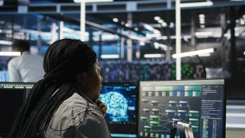 Data center admin does machine learning node tree programming 写真素材