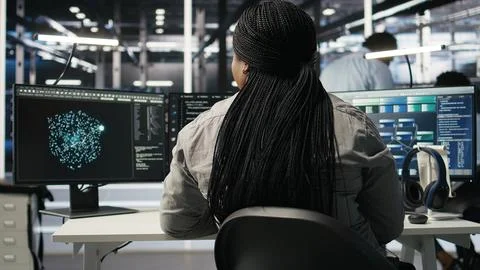 Data center admin does neural networks node tree programming 库存照片