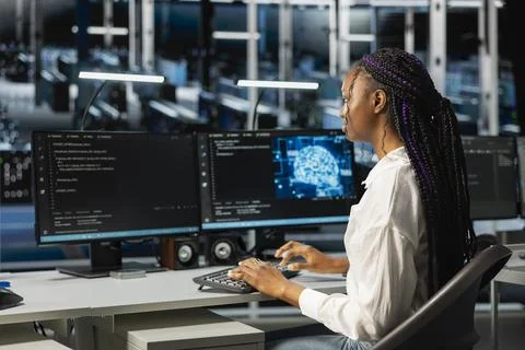 Data center admin running simulations for neural network forecasting Stock Photos