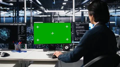 Data center admin typing on isolated screen PC keyboard, using AI Stock Photos