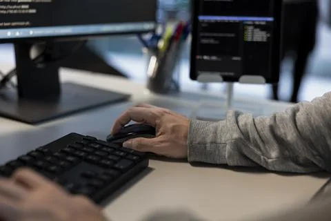 Data center admin typing on keyboard, developing disaster recovery plans Stock Photos