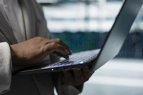 Data center admin updating systems to keeps performance up Foto stock