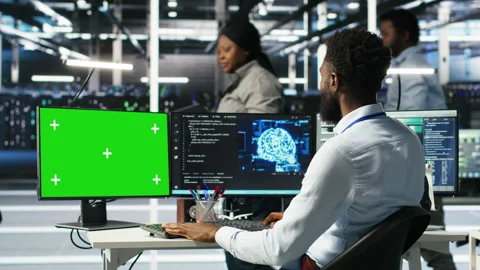 Data center admin using AI node tree software on isolated screen PC Stock Footage 308043310