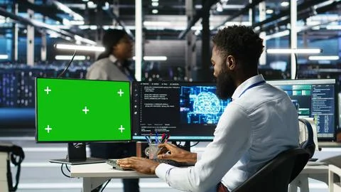 Data center admin using AI node tree software on isolated screen PC Stock Photos