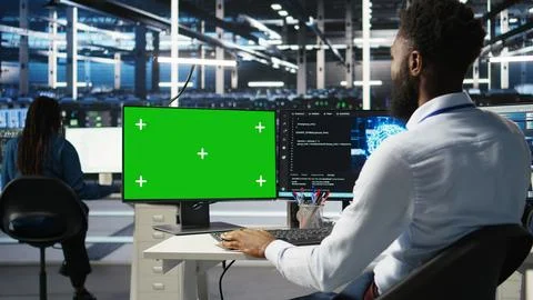 Data center admin using AI node tree software on isolated screen PC Stock Photos