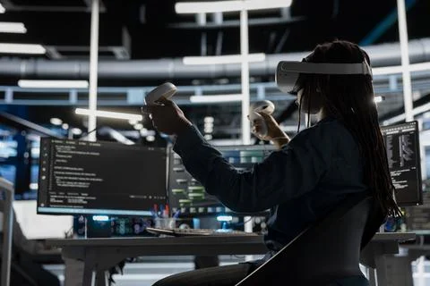 Data center admin using virtual reality to setup machine learning systems Stock Photos