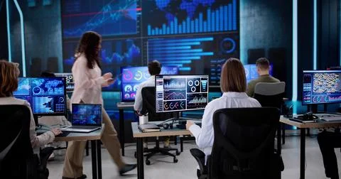 Data center administrator monitors server control Stock Photos