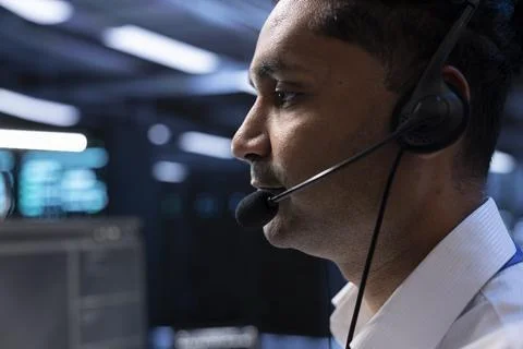 Data center agent assisting engineering teams with hardware installation Stock Photos