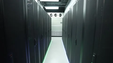 Data Center Aisle Server Racks with Green LED Floor Lighting and Cooling Fans Stock Footage 340048248