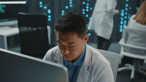 Data center. Asian software developer IT technologist using desktop computer Stock Footage 170458737