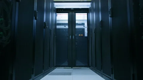 Data Center With Between Two Rows of Fully Operational Server Racks. Concept. Stock Footage 101278601