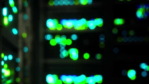 Data center with blinking lights showing network activity at night Stock Footage 345000659