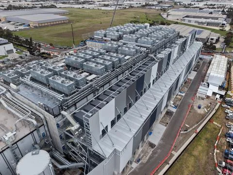 Data center building with server farm infrastructure and industrial cooling Stock Photos