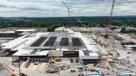 Data center campus in Lancaster shows rooftop cooling arrays, red and yellow Stock Footage 337580576