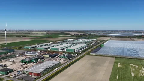 Data center campus powering with renewable wind energy Stock Footage 346897438